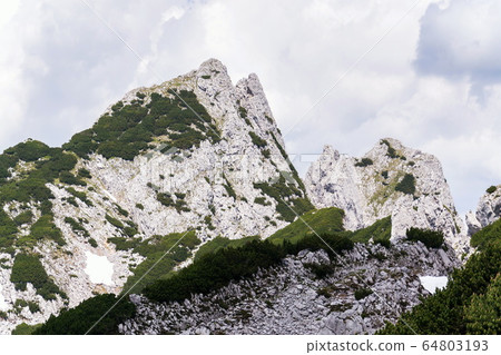 Strichkogel mountain summit between Grosser Donnerkogel and Angerstein in Alps, Gosau, Gmunden district, Upper Austria federal state, sunny summer day, clear blue sky Strichkogel mountain summit between Grosser Donnerkogel and Angerstein in Alps, Gosau, Gmunden district, Upper Austria federal state, sunny summer day, clear blue sky 64803193