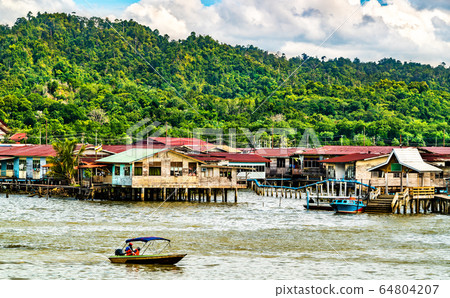 Traditional stilt village Kampong Ayer on the Brunei River in Bandar Seri Begawan Traditional stilt village Kampong Ayer on the Brunei River in Bandar Seri Begawan 64804207