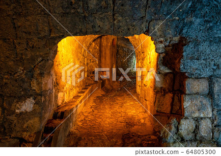 The cerezuelo river under the ruins of the church 64805300