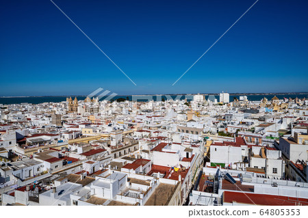 View of the old city rooftops from tower Tavira in View of the old city rooftops from tower Tavira in 64805353