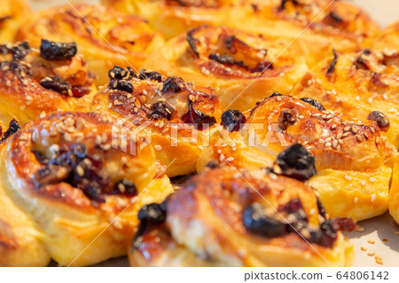Puff pastry sweet roll buns freshly baked Puff pastry sweet roll buns freshly baked 64806142