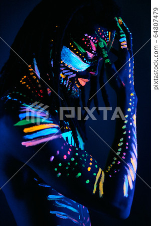 fantastic mysterious male with UV body art fantastic mysterious male with UV body art 64807479