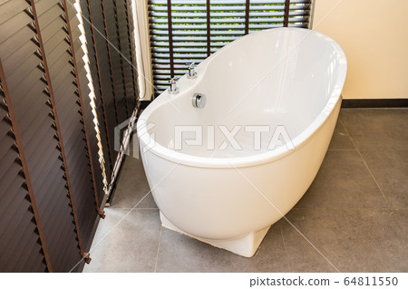White bathtub and jacuzzi decoration interior White bathtub and jacuzzi decoration interior 64811550