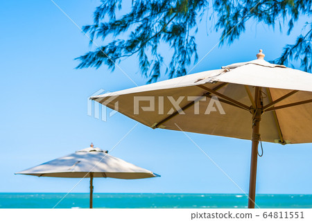 Umbrella and chair around beach sea ocean Umbrella and chair around beach sea ocean 64811551