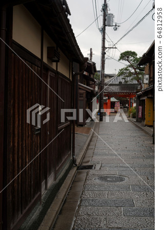 A stone-paved road leading to Yasaka Koshindo in the morning after rain in Kyoto A stone-paved road leading to Yasaka Koshindo in the morning after rain in Kyoto 64812958
