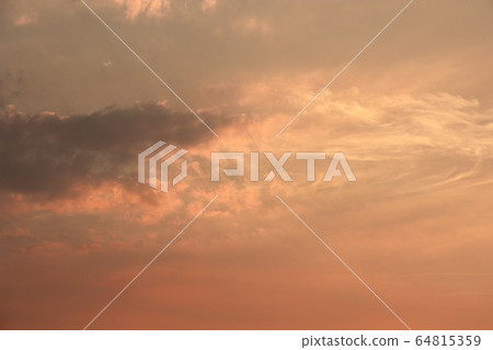Beautiful sunset sky background with clouds 64815359