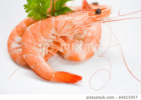 Fresh shrimp on white plate with ingredients 64815957