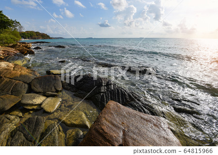 Amazing tropical beach rocky coast / sea ocean Amazing tropical beach rocky coast / sea ocean 64815966