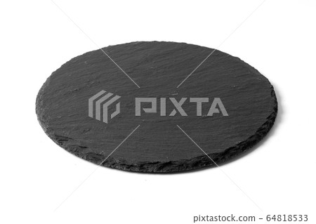 Black round stone plate isolated on white Black round stone plate isolated on white 64818533