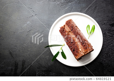 Piece of truffle cake 64819121