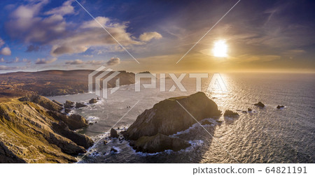 Aerial view of the amazing coast by Port in County Donegal - Ireland / Toralaydan Island, Stea Stacks: Baltic Spire, An Bhuideal, Tormore Island, Cnoc na mara 64821191