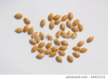 Sweet pumpkin seeds 64823121