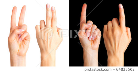 Female hand showing two fingers in the peace Female hand showing two fingers in the peace 64825502