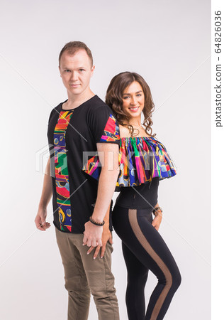 Funny couple dancing social dance. Kizomba or bachata or semba or taraxia , on white background. Social dance concept. Funny couple dancing social dance. Kizomba or bachata or semba or taraxia , on white background. Social dance concept. 64826036