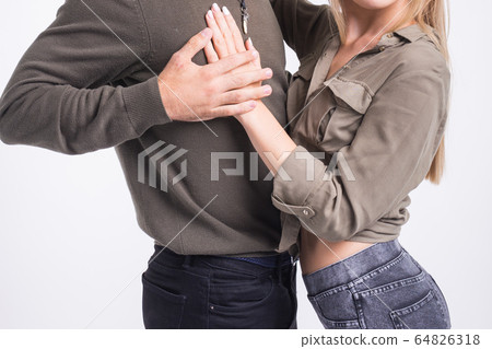 Beauty couple dancing social dance. Kizomba or bachata or semba or taraxia , on white background. Social dance concept. Beauty couple dancing social dance. Kizomba or bachata or semba or taraxia , on white background. Social dance concept. 64826318