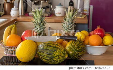 Many varieties of fresh and exotic fruits with a 64826692