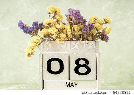 cube calendar for may on green background with 64828551