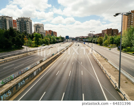 Empty M30 Highway in Madrid during COVID-19 pandemic outbreak and quarantine 64831396