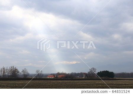 Scenery with farms in the Tokachi region of Hokkaido Scenery with farms in the Tokachi region of Hokkaido 64831524