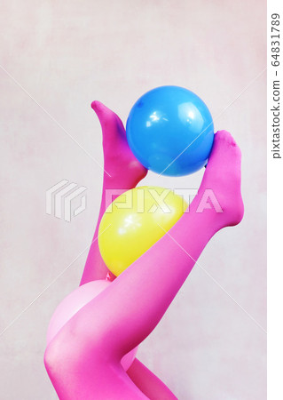 Pop art about legs wearing pink tights and holding Pop art about legs wearing pink tights and holding 64831789