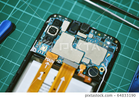 Phone repair, Fixing damaged mobile smartphone and hardware part changing. 64833190
