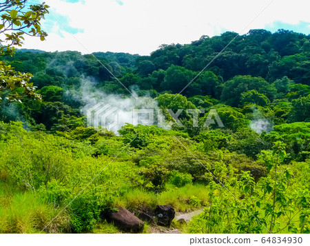 Boiling mud pot in Rincon de la Vieja national Boiling mud pot in Rincon de la Vieja national 64834930