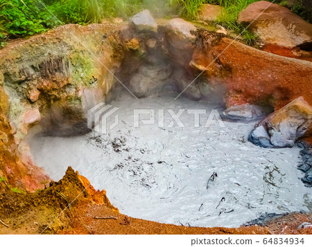 Boiling mud pot in Rincon de la Vieja national Boiling mud pot in Rincon de la Vieja national 64834934