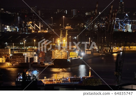 Container Port in Rotterdam at night 64835747