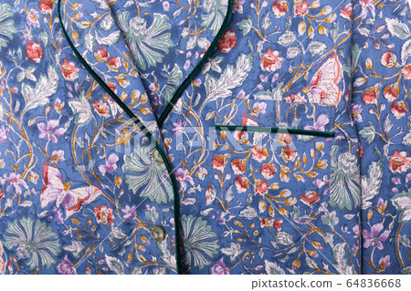 Close-up detail and fabric texture of a pajama. Homewear, sleepwear, shopping and sale concept. 64836668