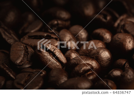 close up dark roasted coffee beans on heap, Low close up dark roasted coffee beans on heap, Low 64836747