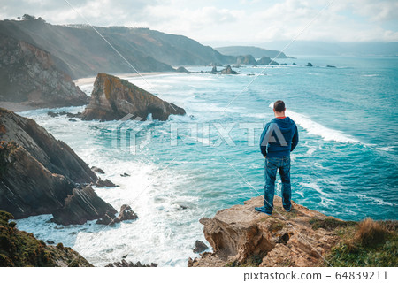 One man enjoying the view of the cliffs of Loiba, One man enjoying the view of the cliffs of Loiba, 64839211