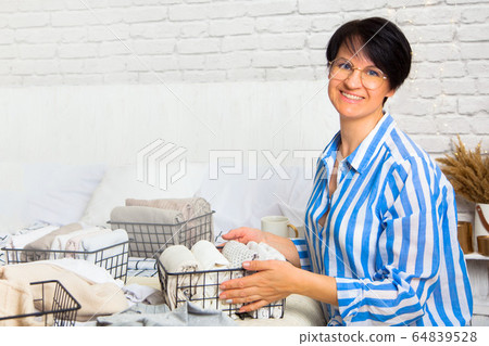 Beautiful young positive caucasian housewife woman Beautiful young positive caucasian housewife woman 64839528