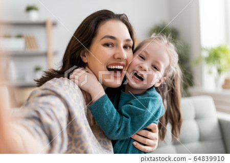 mom and child are having fun at home mom and child are having fun at home 64839910