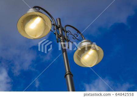 Vintage black iron street lamp Vintage black iron street lamp 64842558