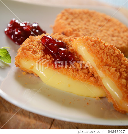 Cutlets with melted cheese Cutlets with melted cheese 64848927
