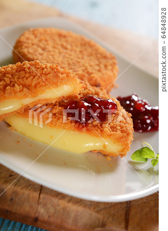 Cutlets with melted cheese Cutlets with melted cheese 64848928