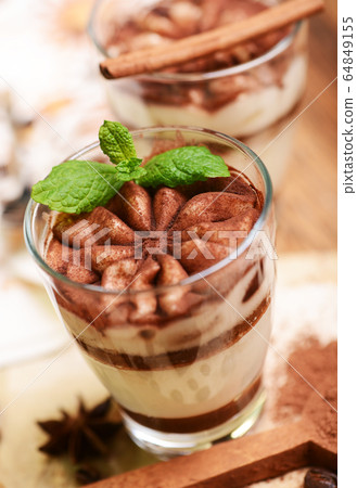 Tiramisu dessert in glass 64849155