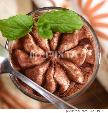 Tiramisu dessert in glass 64849159