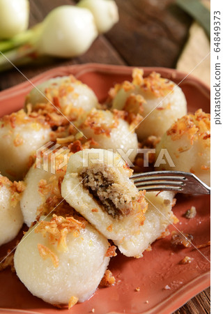 Meat stuffed dumplings 64849373