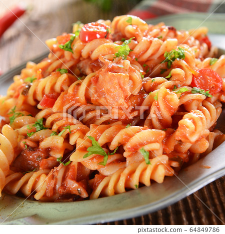 Pasta with hot tomato sauce and chili pepper Pasta with hot tomato sauce and chili pepper 64849786
