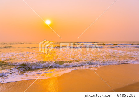 Beautiful tropical nature around sea beach ocean at sunset or sunrise time Beautiful tropical nature around sea beach ocean at sunset or sunrise time 64852295