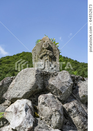 Shinshu Hakuba Village Stone Buddha in Aoki Village Shinshu Hakuba Village Stone Buddha in Aoki Village 64852673