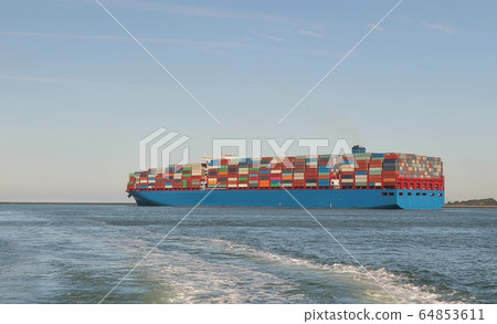 Huge Container Ship in the Port of Rotterdam 64853611
