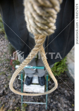 man is going to hang the noose 64857974