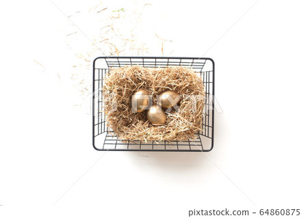 Top view of an iron mesh basket with a nest. Nordic style Top view of an iron mesh basket with a nest. Nordic style 64860875