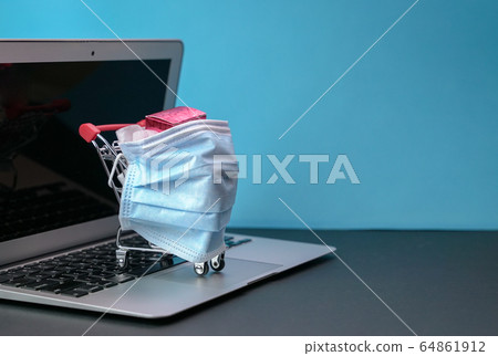 Shopping trolley or cart wrapped with medical face Shopping trolley or cart wrapped with medical face 64861912