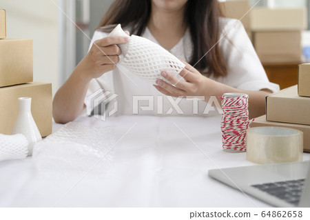 Online small business owner. 64862658