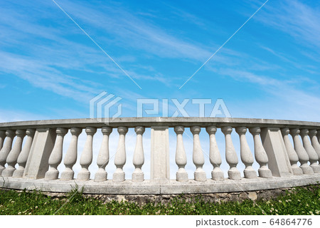White balustrade on blue sky with clouds and copy space 64864776