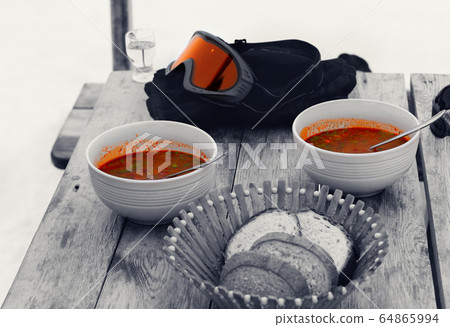 Black and white wooden table with lunch in outdoor Black and white wooden table with lunch in outdoor 64865994