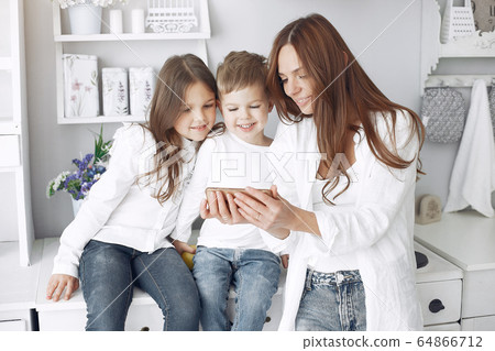 Mother with little children having fun at home Mother with little children having fun at home 64866712